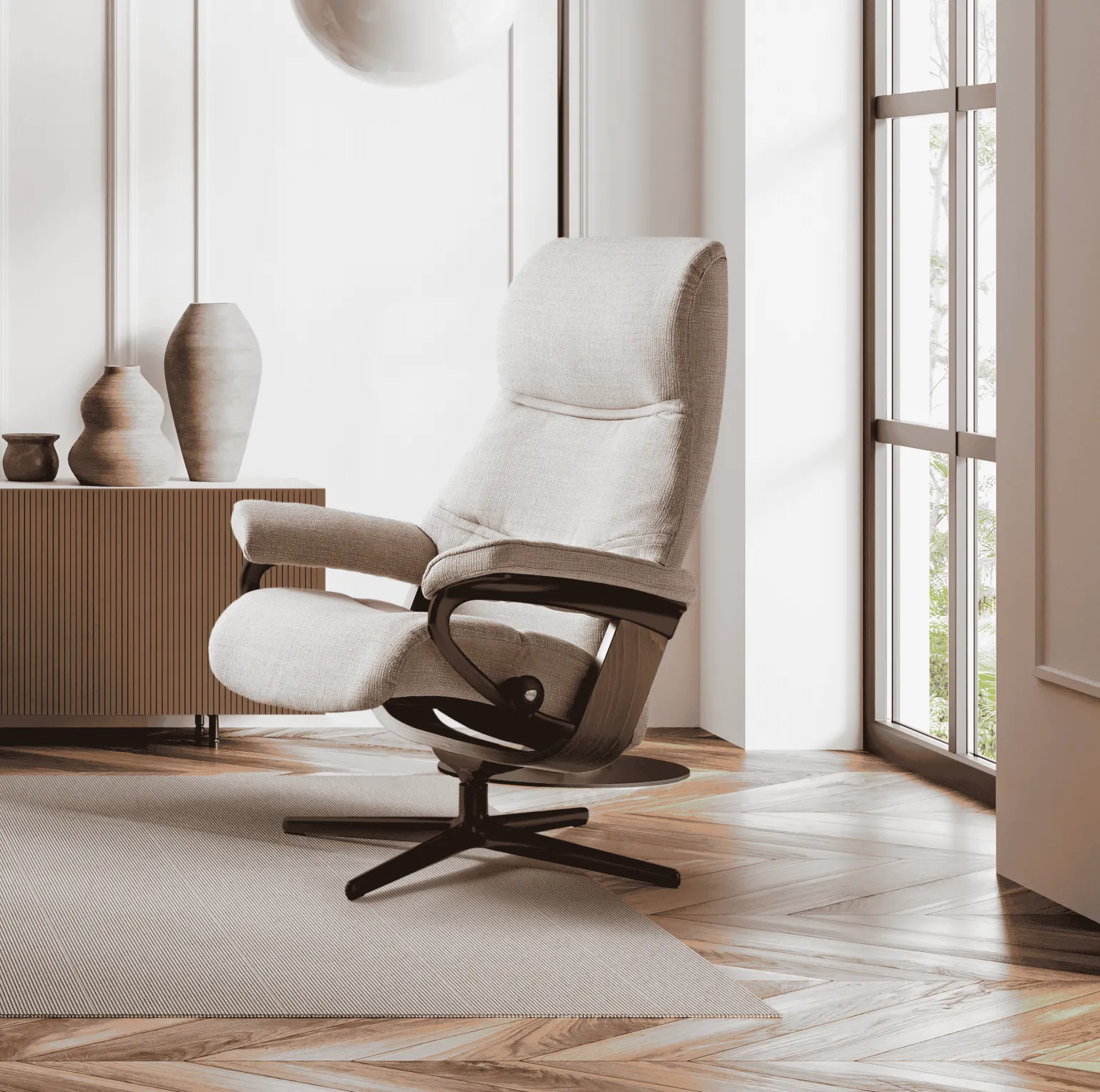 The Stressless Paul recliner is visually appealing, with curved lines and extra foam added on the sides of the backrest. The wing-shaped backrest with extra padding plus covered armrests provide the comfortable feeling of being hugged whilst sitting, alongside a smile-shaped seat that allows you to really sink into the chair. The headrest can be lengthened by up to 7cm, making Stressless Paul their tallest recliner to date.

Beneath its premium detailing, the Paul recliner features the patented Plus™ and Glide™ systems, which automatically adjust to your body’s movement. 

Choose from a Cross or Signature base and customise your recliner with a variety of leathers, fabrics, wood and metal colours. 
