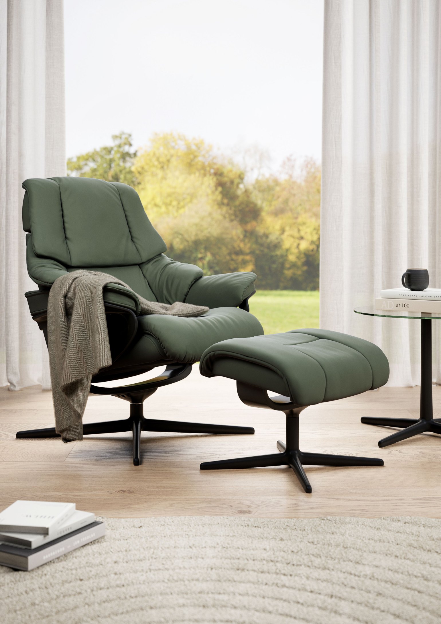 The Stressless Reno is one of the most popular recliners in the Stressless collection, and for good reason. Designed with luxuriously padded cushions, a height-adjustable headrest, and a generously supportive backrest, the Reno delivers an exceptional level of comfort that’s perfect for daily relaxation. The comfortable neck rest can be adjusted up to 10 cm to support users that need that extra bit of length.

Featuring the patented Stressless Glide™ and Plus™ systems, the Reno adjusts intuitively to your body’s movements offering continuous support, whether you’re sitting upright or fully reclined.

Available in Small, Medium, and Large sizes, the Reno can be personalised with a wide choice of leathers, fabrics, and base styles, including Classic, Signature, and Cross. A matching footstool is also available for full-body relaxation.
